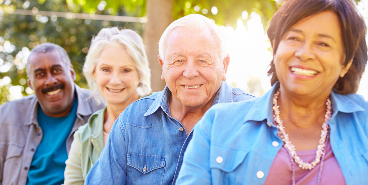 Outdoor Group Portrait Of Senior Friends