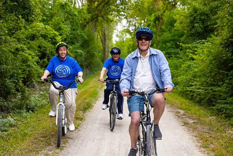 Three senior residents of Monarch Landing exploring friendship in senior living communities in Naperville, IL.