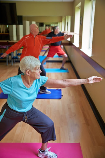 seniors-engaging-in-stretches-for-exercising-seniors