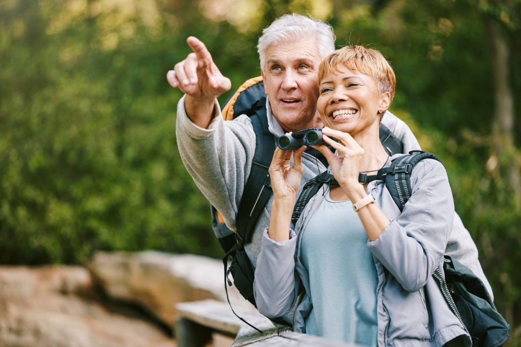 Senior couple bird watching